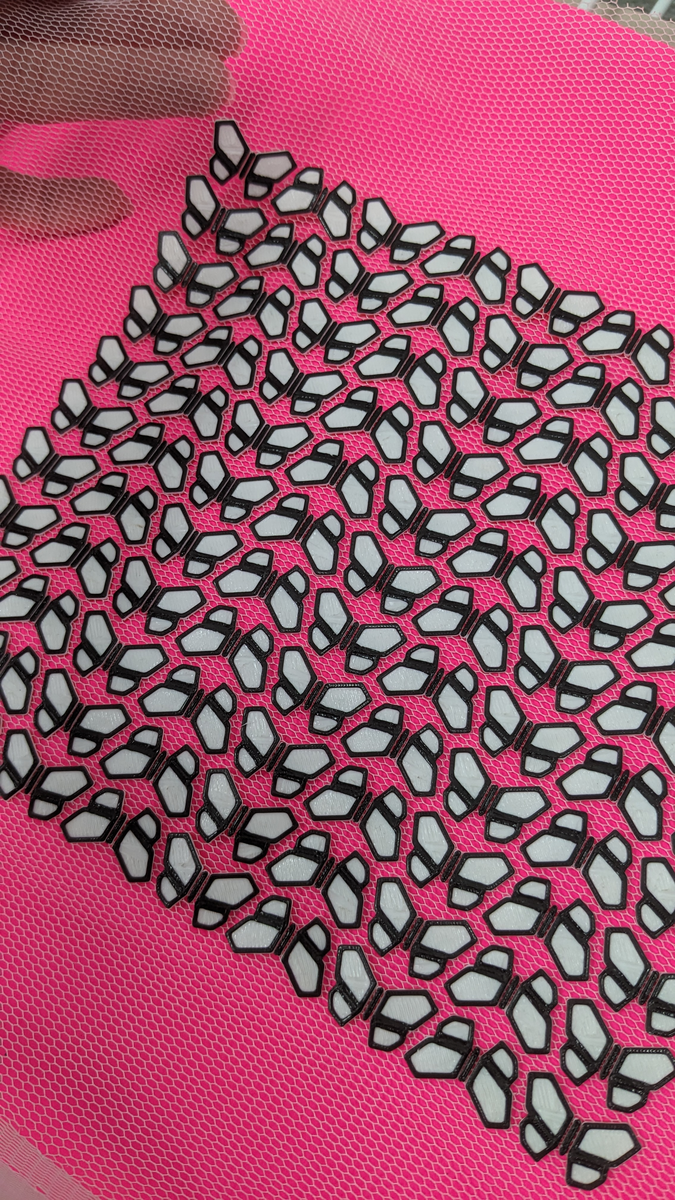 Flat lay example of £D printing experiment with fabric